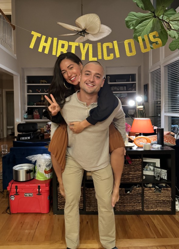 Chazlyn and Nicolas celebrating a thirtieth birthday at home