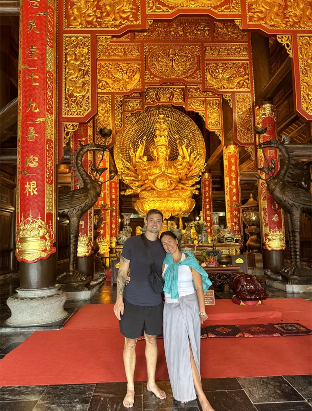 Chazlyn and Nicolas inside a golden temple