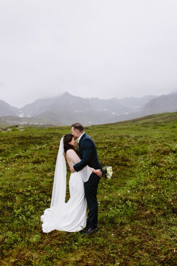 Chazlyn and Nicolas exchanging vows at Hatcher Pass, Alaska